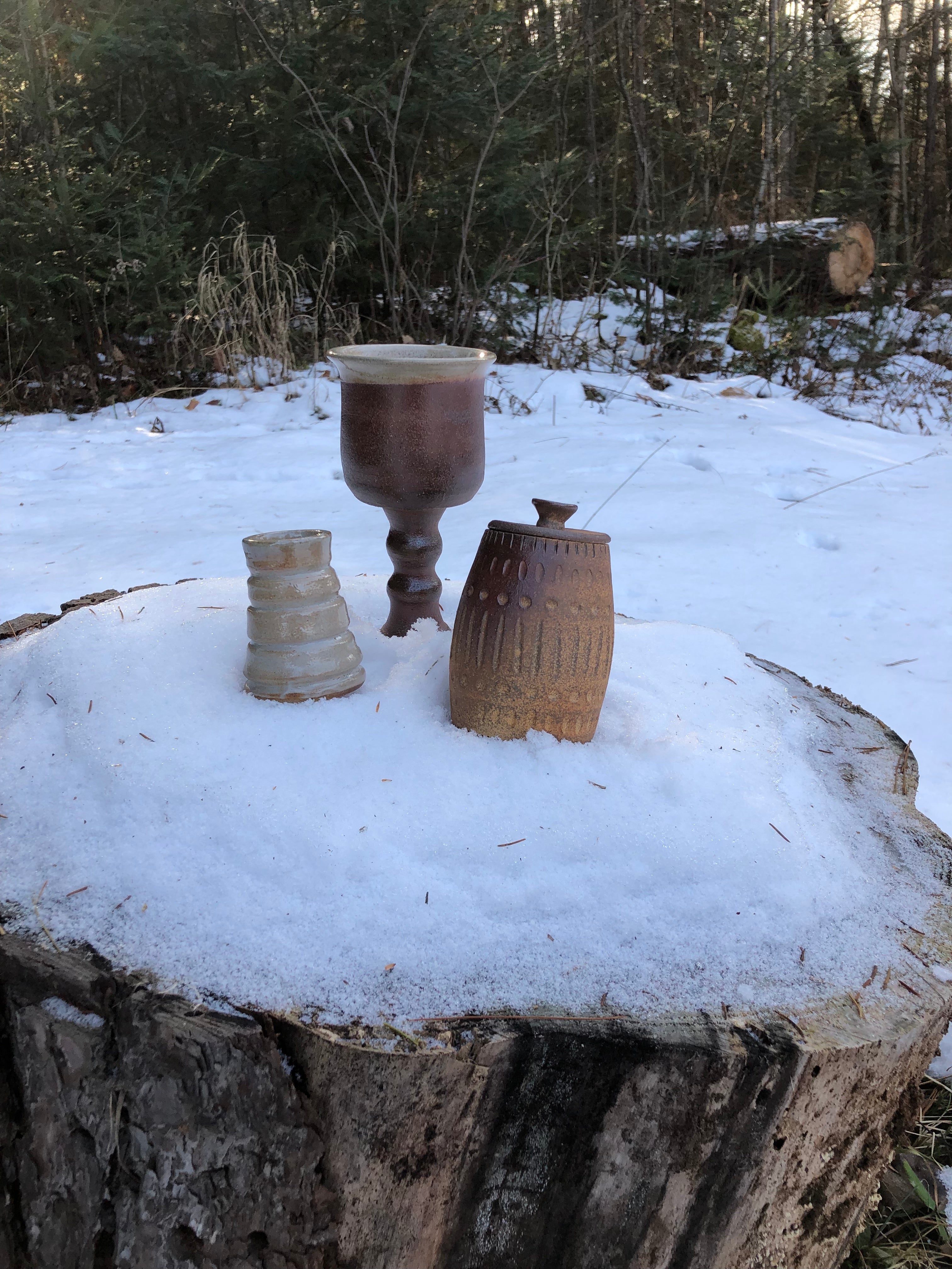 Woodfired candlestick, goblet and lidded vessel.